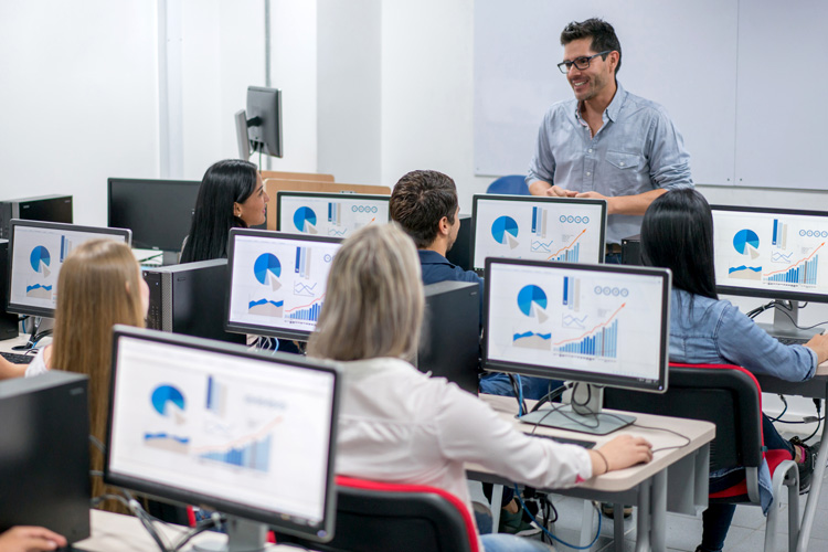 The teacher is giving a data science class to a group of students at school.